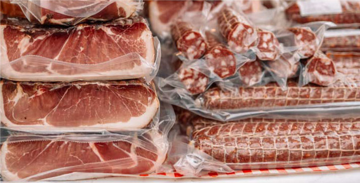 Productos cárnicos procesados y embutidos como mercancía garantizable